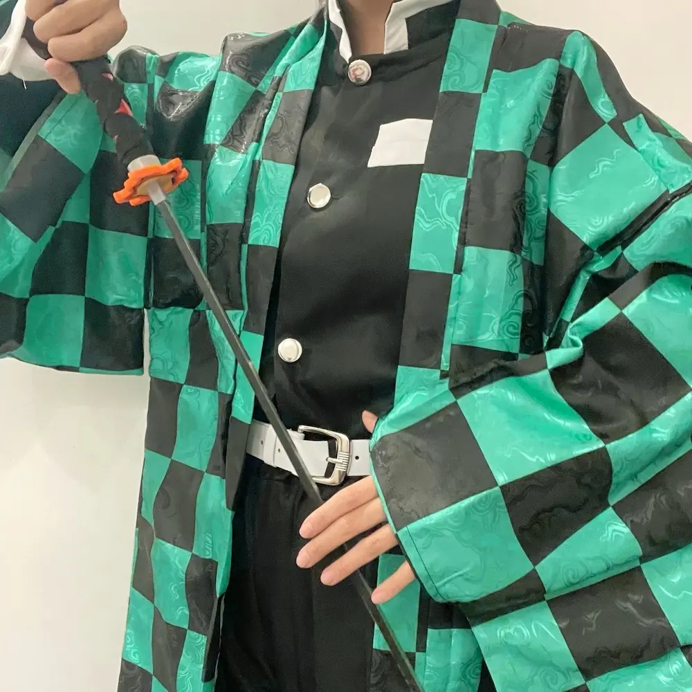 Tanjiro cosplay haori subtle woven texture fabric detail – Demon Slayer costume material close up